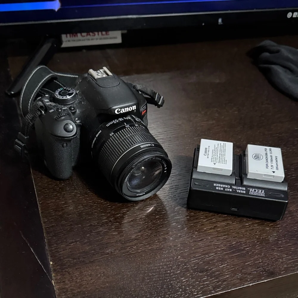 Canon Black DSLR with 18-55mm Kit Lens and Dual Battery Charger